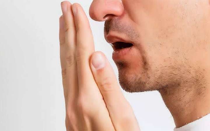 মুখে দুর্গন্ধের কারণ ও প্রতিকার